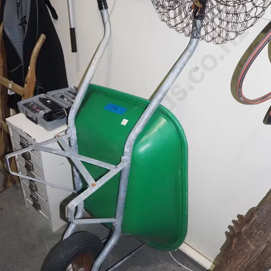 green plastic garden barrow