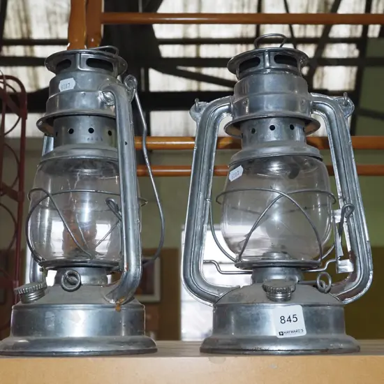 pair of hurricane lanterns