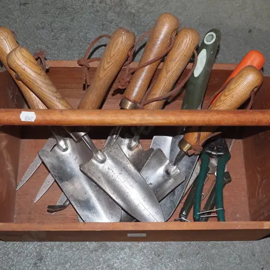 wooden basket and garden tools