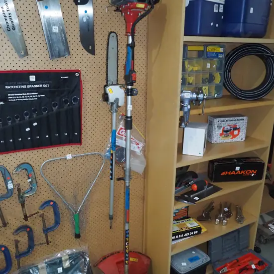 Morrison 2 stroke multi tool with weed bar and chainsaw attachment