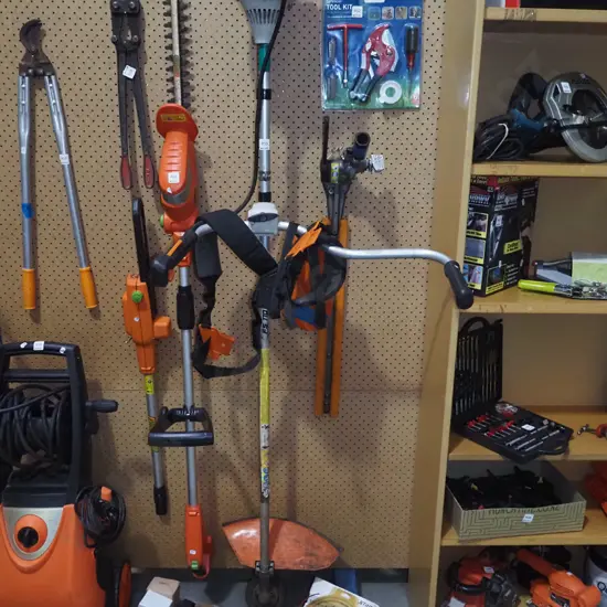 Stihl multi tool with line trimmer and hedge trimmer attachments and accessories