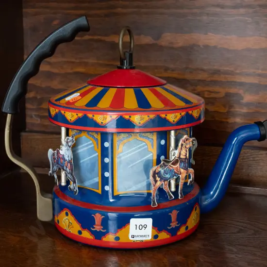 enamelled kettle with steam-driven carousel mechanism - some minor corrosion inside lid - mechanism untested