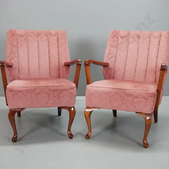 pair of retro mahogany open-arm lounge chairs w/ cabriolet front legs, pink velvet upholstery with pleated backs - some