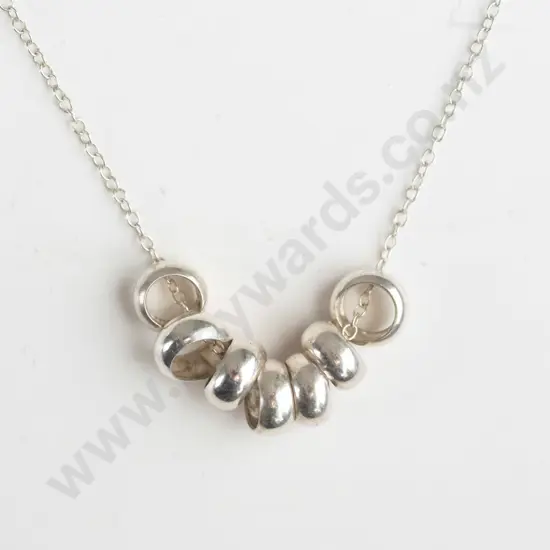silver necklace with 7 small rings chain stamped 925