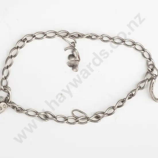 silver charm bracelet with 2 charms
