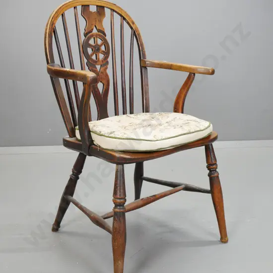 late Georgian oak & elm Windsor wheel-back carver chair with turned legs and stretchers, with loose cushion. Extensive