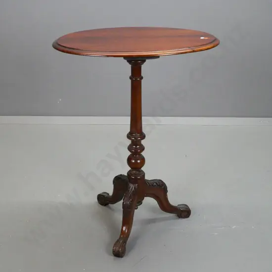 Victorian oval-top wine table with mahogany top, walnut base, w/turned stem on 3 carved cab legs - some pitting &