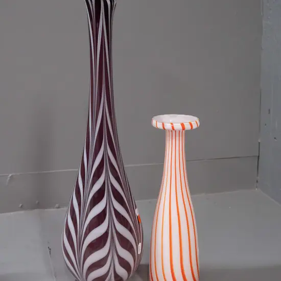 2 art glass vases with with orange swirls and amethyst & white over clear base H-470