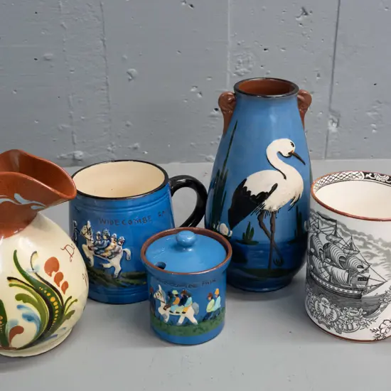 Adams mug with intertwined handle and nautical motifs, and 4 pieces of Torquay ware. Adams mug has some fretting to