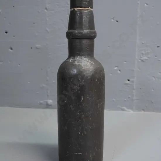 glass bottle encased in lead H-250