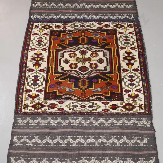 hand knotted Persian style wool floor rug with multi coloured pattern and borders - small dark stain near one edge L1550