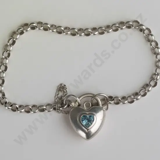 silver bracelet with aquamarine stone in heart clasp stamped 925