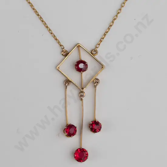 9ct gold drop pendant with tongue & tube catch square with 3 drops each set with red stones & in centre of main frame