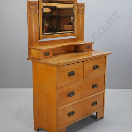 art nouveau oak dressing table w/ bevelled edge mirror, carved supports, over shelf and 2 small drawers, 4 lower drawers