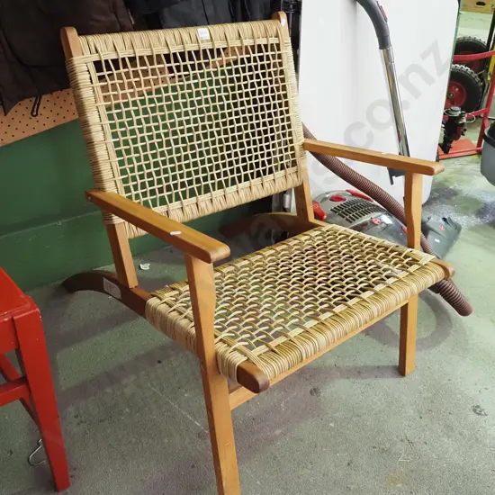 solid and wood and woven plastic armchair