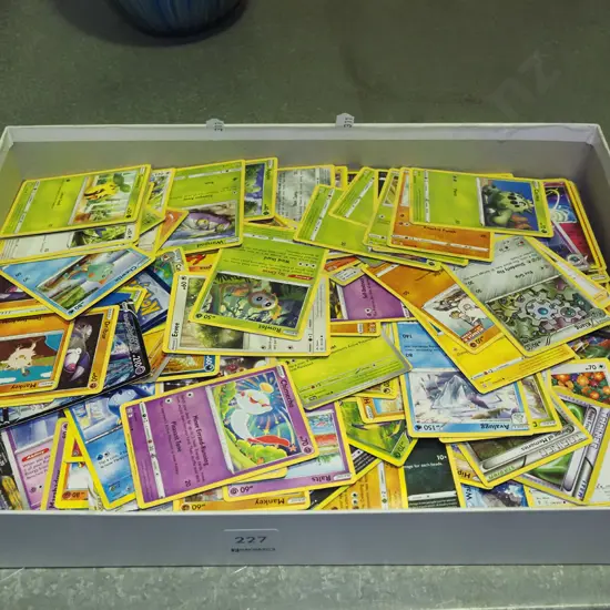tray of Pokemon collector cards