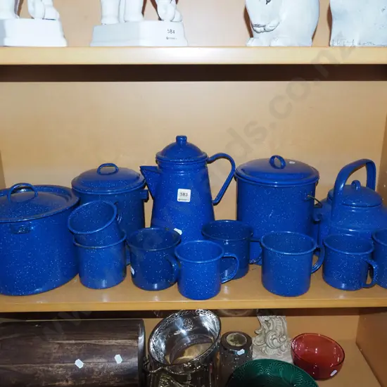 shelf of blue speckled enamel ware