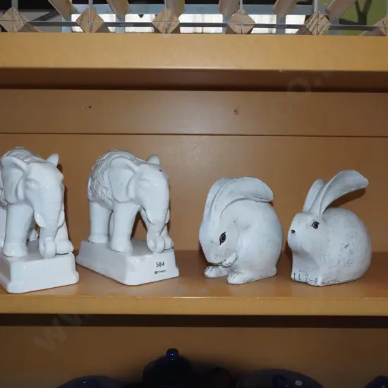 ceramic elephants, wooden rabbits