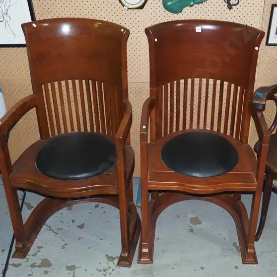 2x leather upholstered high back rosewood chairs