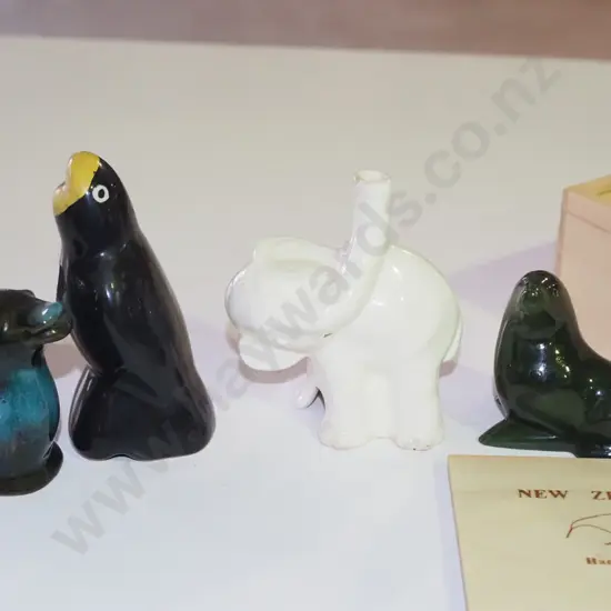 carved greenstone seal figurine, vintage pie funnels, small Blue Mountain duck