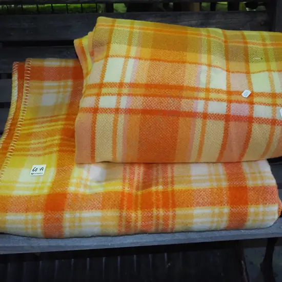 2x orange and yellow checked blankets