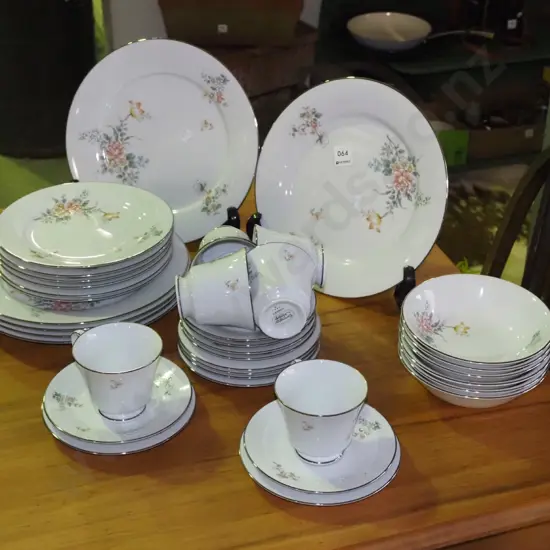 Noritake Coquet floral dinner items; plates, bowls, cups and saucers