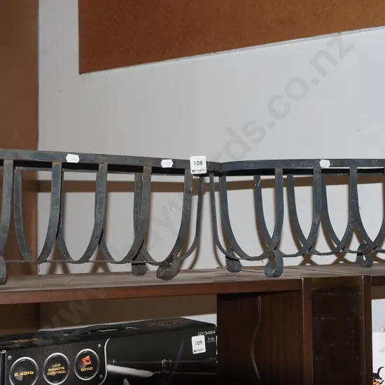 2x wrought metal planter baskets