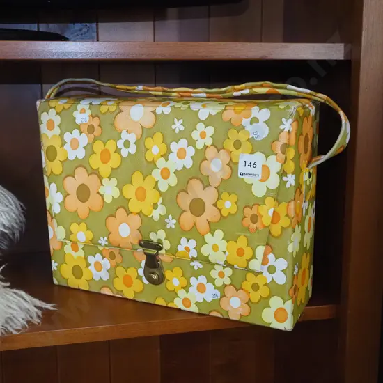 retro hair dryer in floral carry case