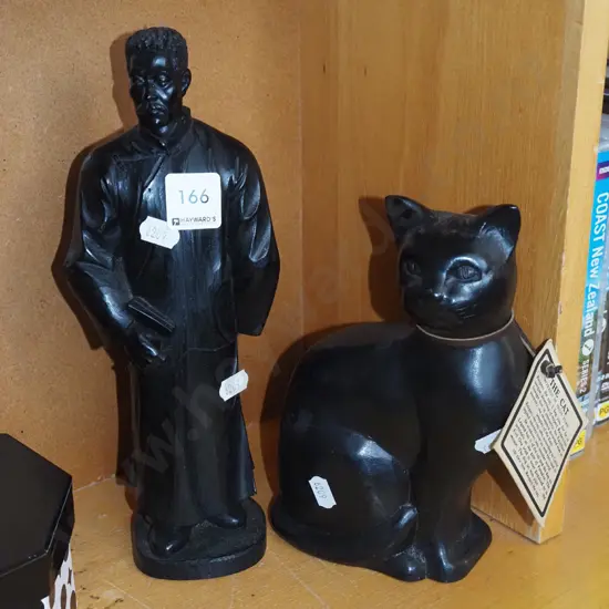 2x carved wooden figurines; cat, man with book H-280