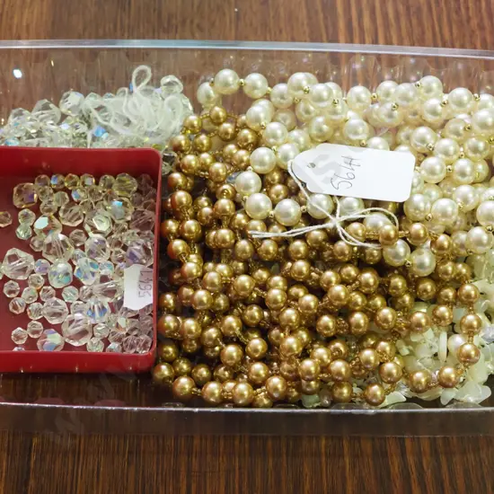 tray of beaded necklaces etc