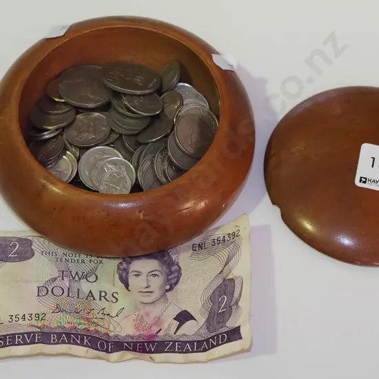 turned wooden trinket box; notes, coins