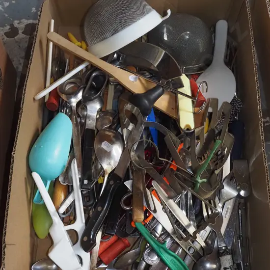 box of kitchen utensils