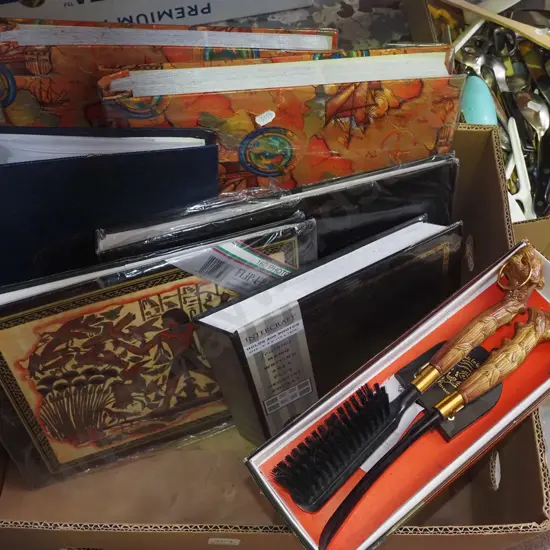 box; shoe horn, clothes brushes, photo albums