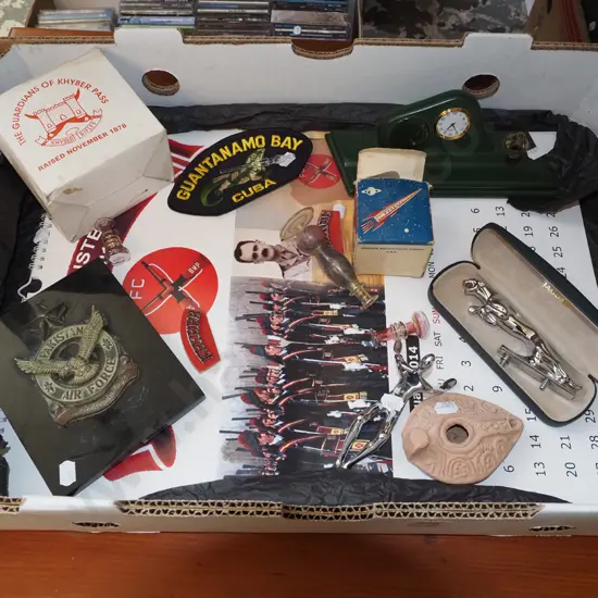 box; Pakistan Airforce plaque, desk top set, Jaguar hood ornament, spinning top etc