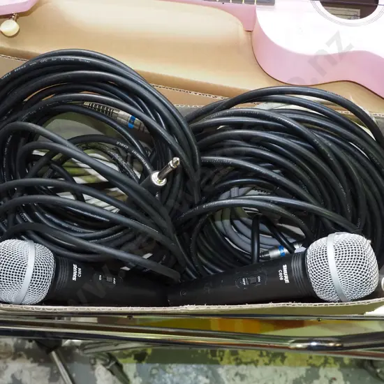 box; microphone leads, power cords, 2x Shure microphones