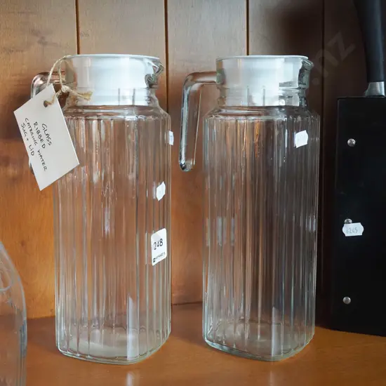 2x ribbed glass water jugs