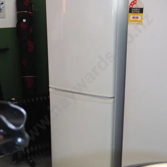 F&P fridge/freezer - missing foot stay at left back - some dints and marks to doors H-1600 W-530 D-560