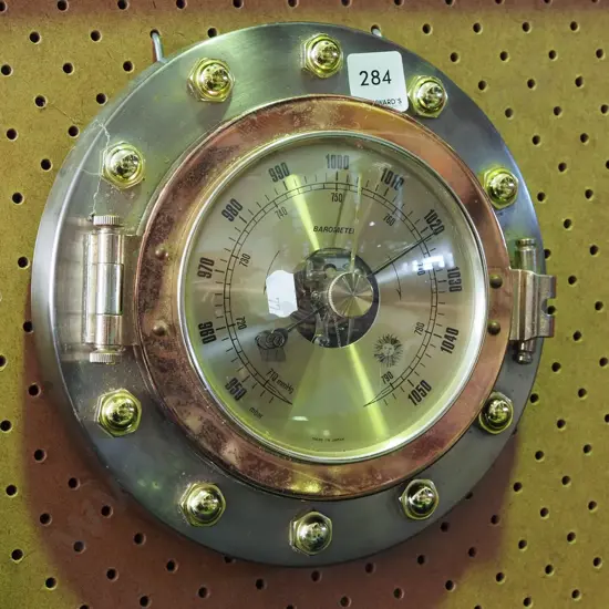 ship's port hole barometer
