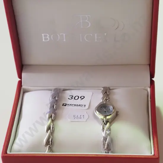 silver ladies wristwatch and bracelet