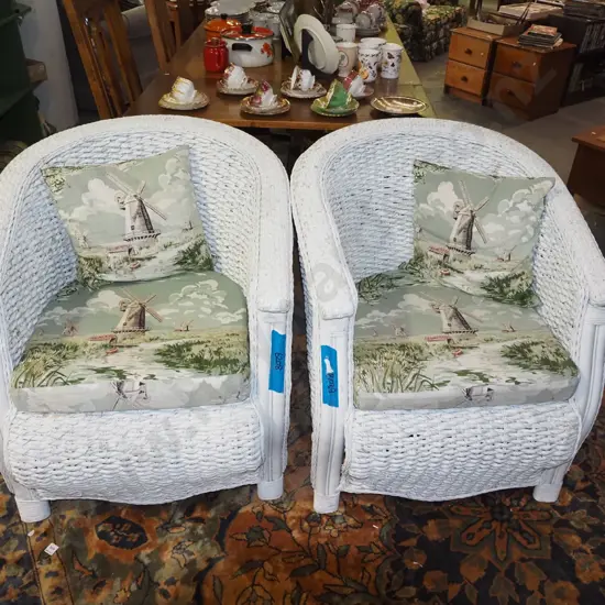 pair of white painted cane and seagrass tub chairs 