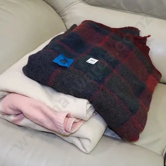cream and checked woollen blankets