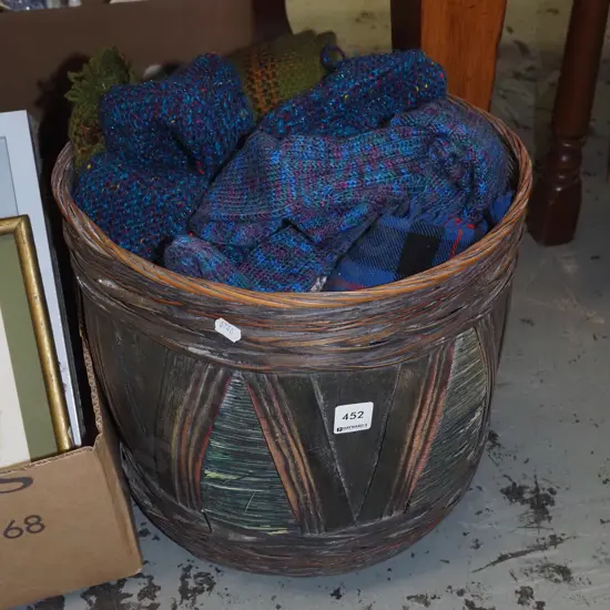 cane basket; woollen gloves, socks, scarves etc