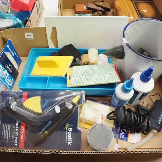 box; biscuit cutters, glue sticks etc
