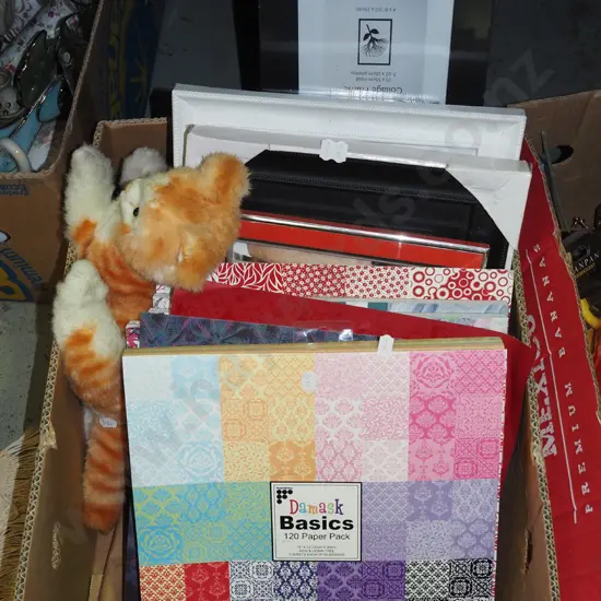 box; soft toy kitten, picture frames, scrapbook paper packs etc