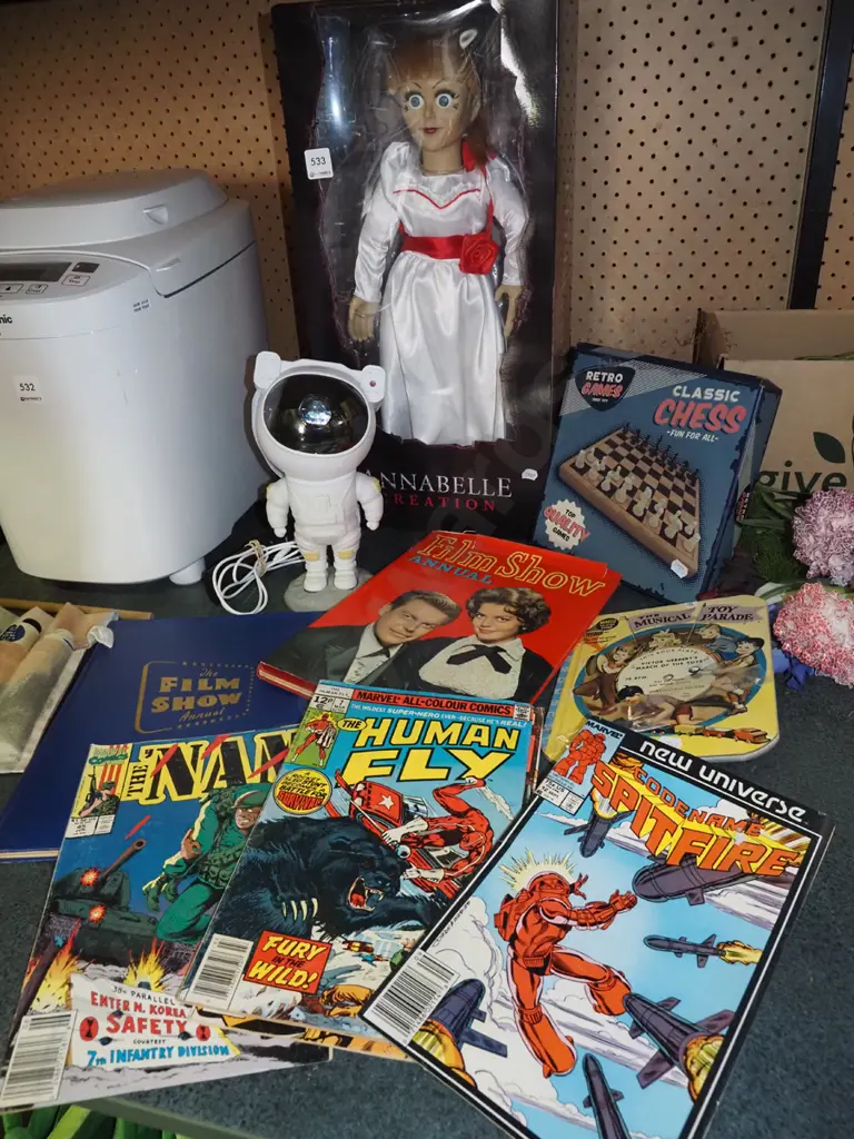 Annabelle Creation doll, astronaut star projector, chess set, books, comics Image 1++