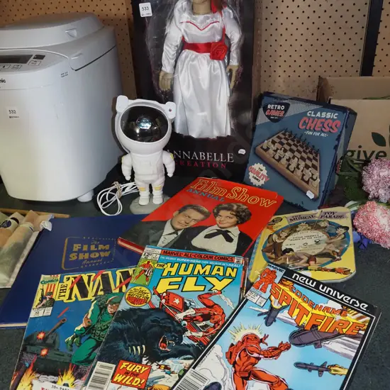 Annabelle Creation doll, astronaut star projector, chess set, books, comics