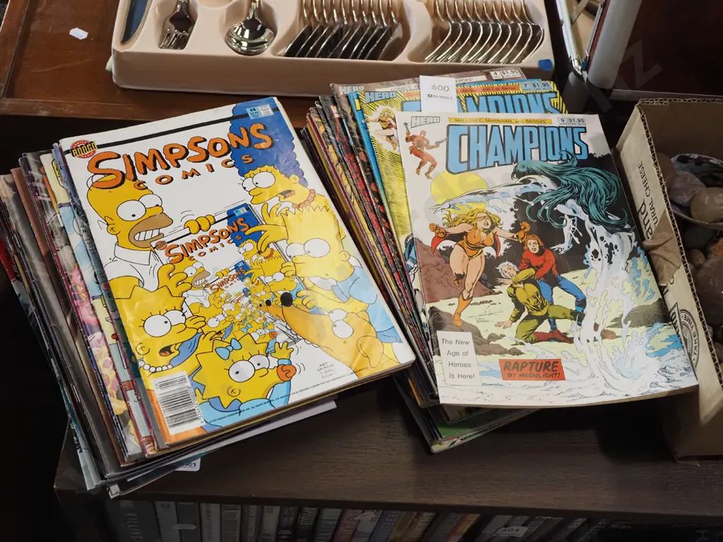 stack of comic books Image 1++