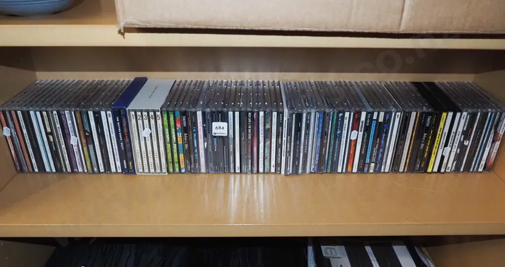 shelf of CDs Image 1++