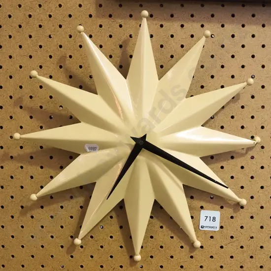 metal star wall clock