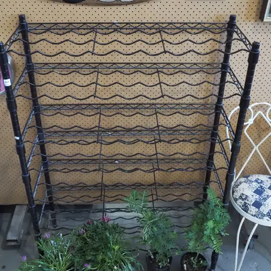 black metal wine rack